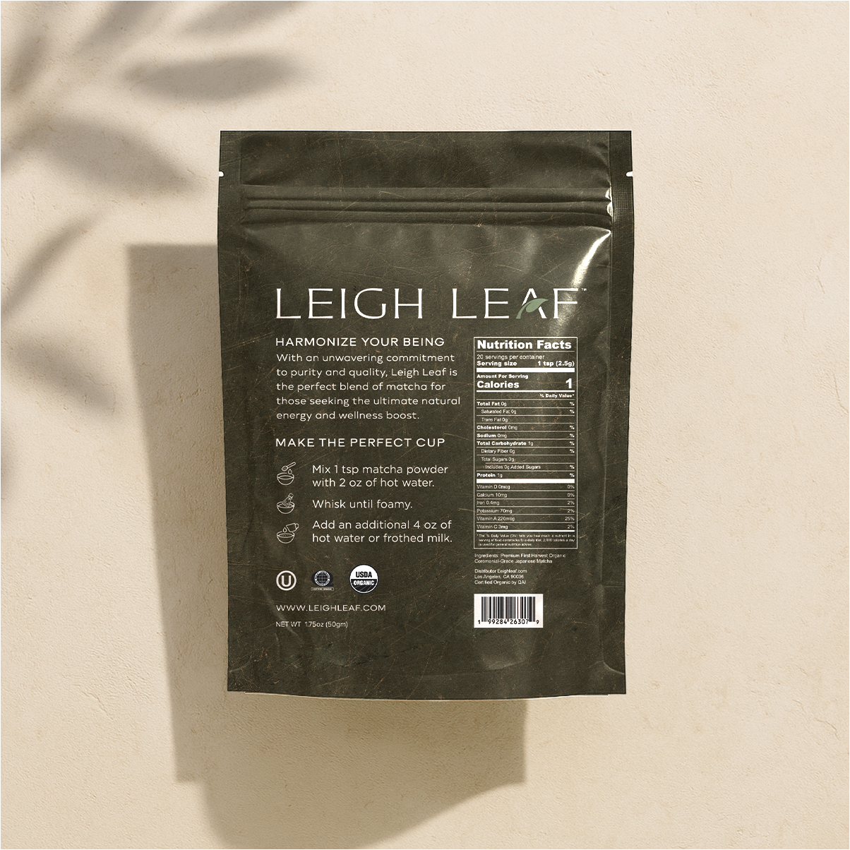 Pouring a vibrant green tea made from Leigh Leaf's Premium Organic Ceremonial Grade Matcha - 50g Bag, highlighting its traditional preparation and exquisite taste.